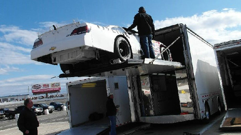 lifting car up on trailer